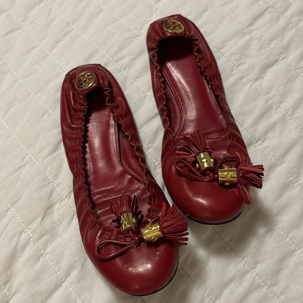 Tory Burch orange Reece tassel ballet flats size 7